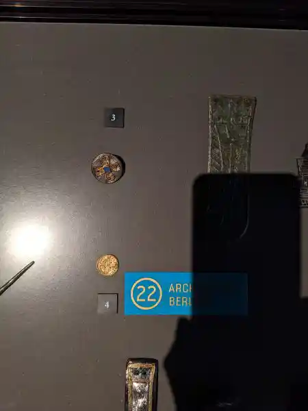 Display of a Merovingian filigree disc-brooch and gold bracteate from the 6th and 7th centuries AD